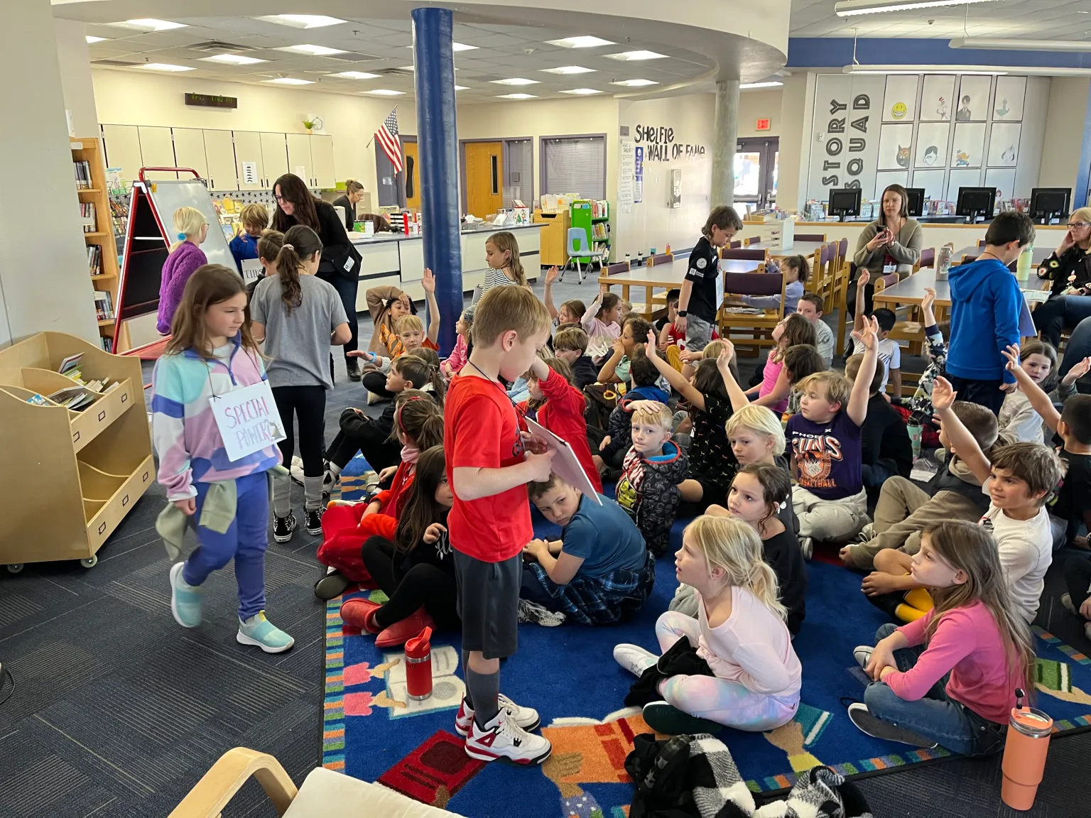 Jennifer Hayes presenting during a school author visit.