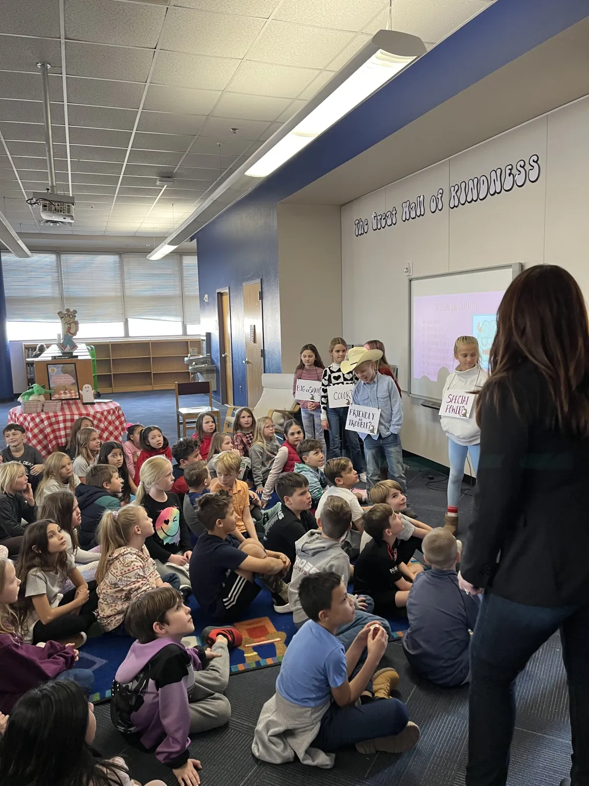 Jennifer Hayes interacting with students on an author visit.