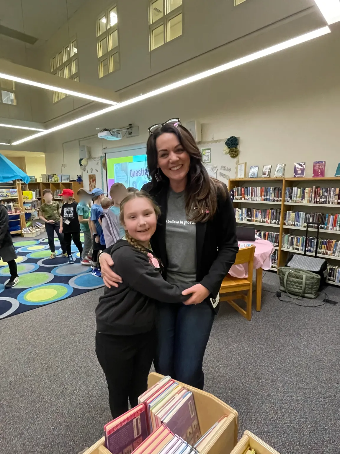 Author Jennifer Hayes at a school visit with students and staff.