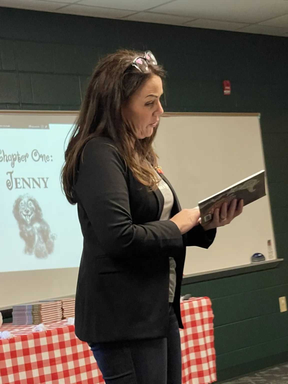 Jennifer Hayes and students during a school visit activity.